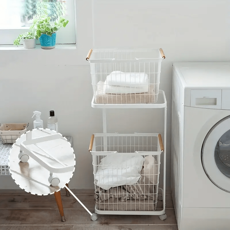 Self standing laundry storage basket with compartments and movable rollers
